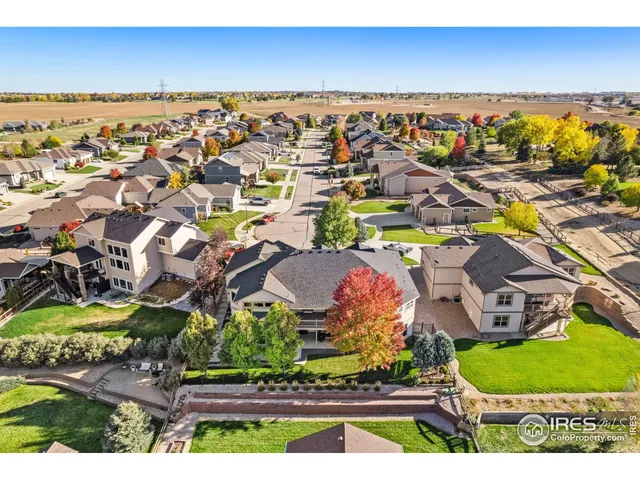 an aerial view of a house with a garden
