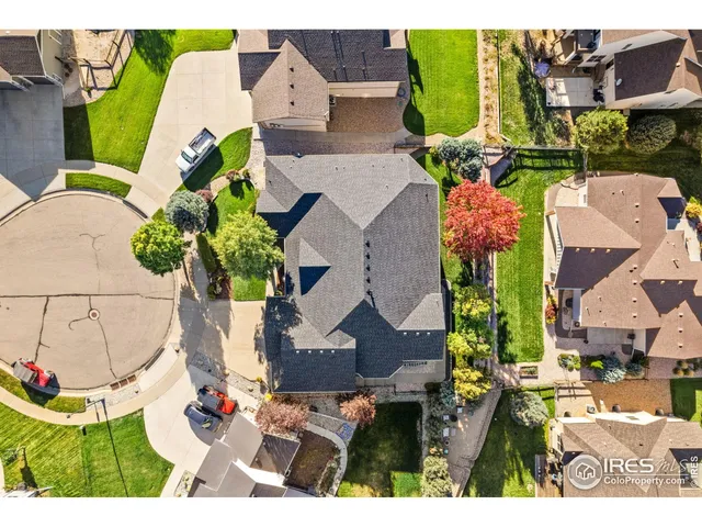 an aerial view of a house with a garden