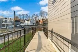 a view of balcony and wooden floor