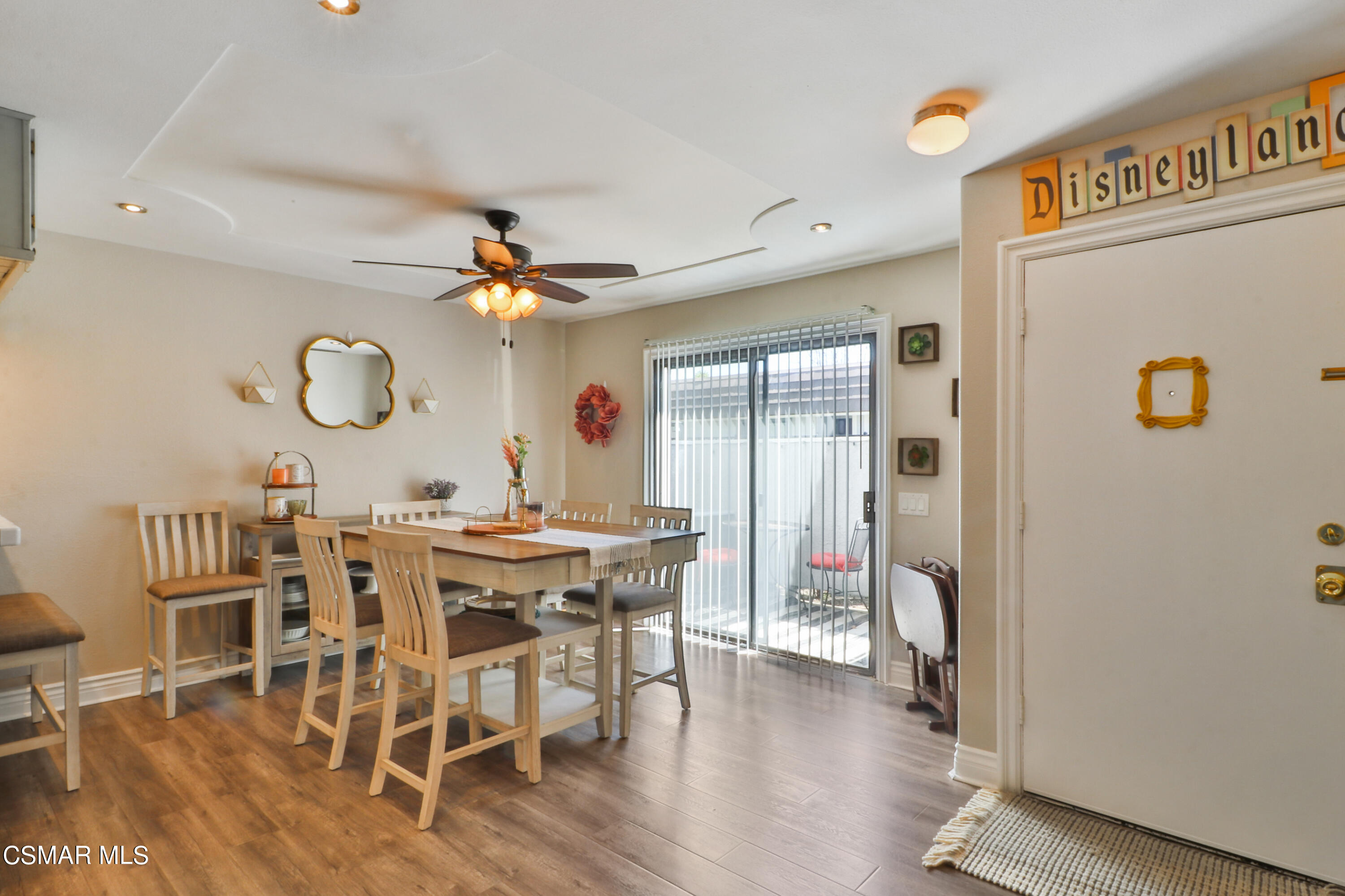 2346 Royal Avenue, Unit 9 Simi Valley, CA 93065 - Photo 11 of 31 a view of a dining room with furniture and wooden floor