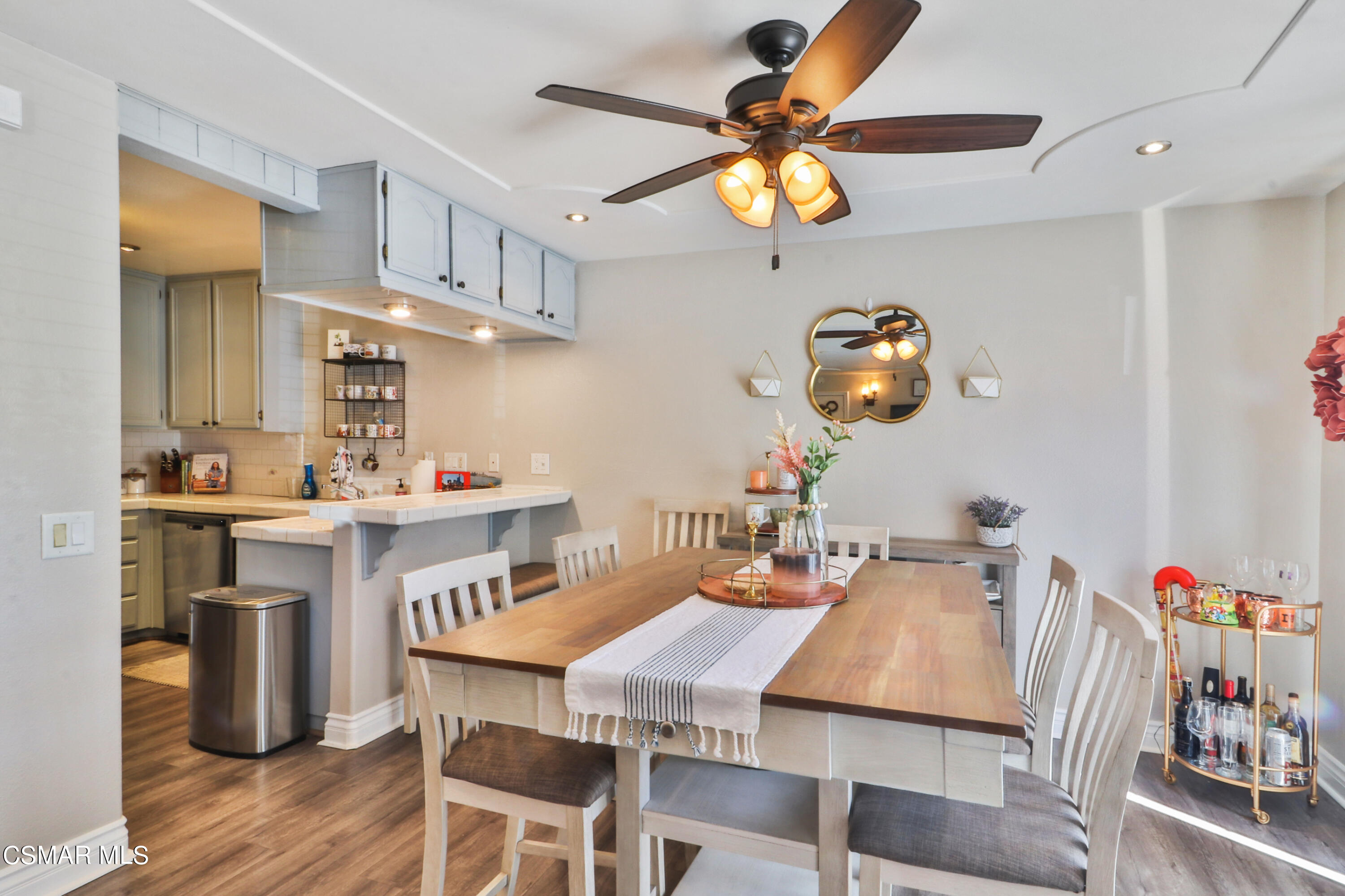 2346 Royal Avenue, Unit 9 Simi Valley, CA 93065 - Photo 12 of 31 a view of a dining room with furniture and wooden floor