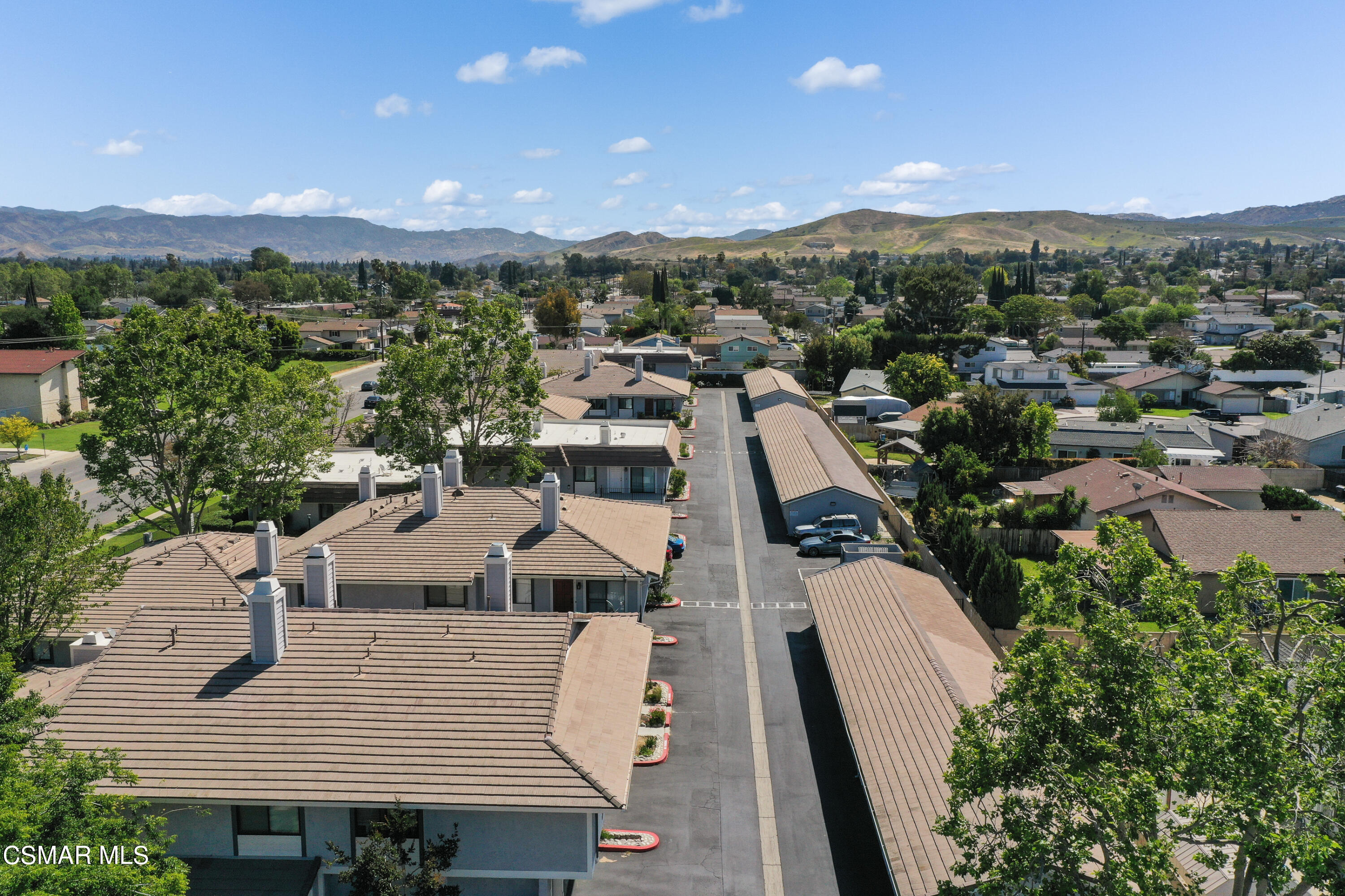 2346 Royal Avenue, Unit 9 Simi Valley, CA 93065 - Photo 2 of 31 an aerial view of a house with a swimming pool