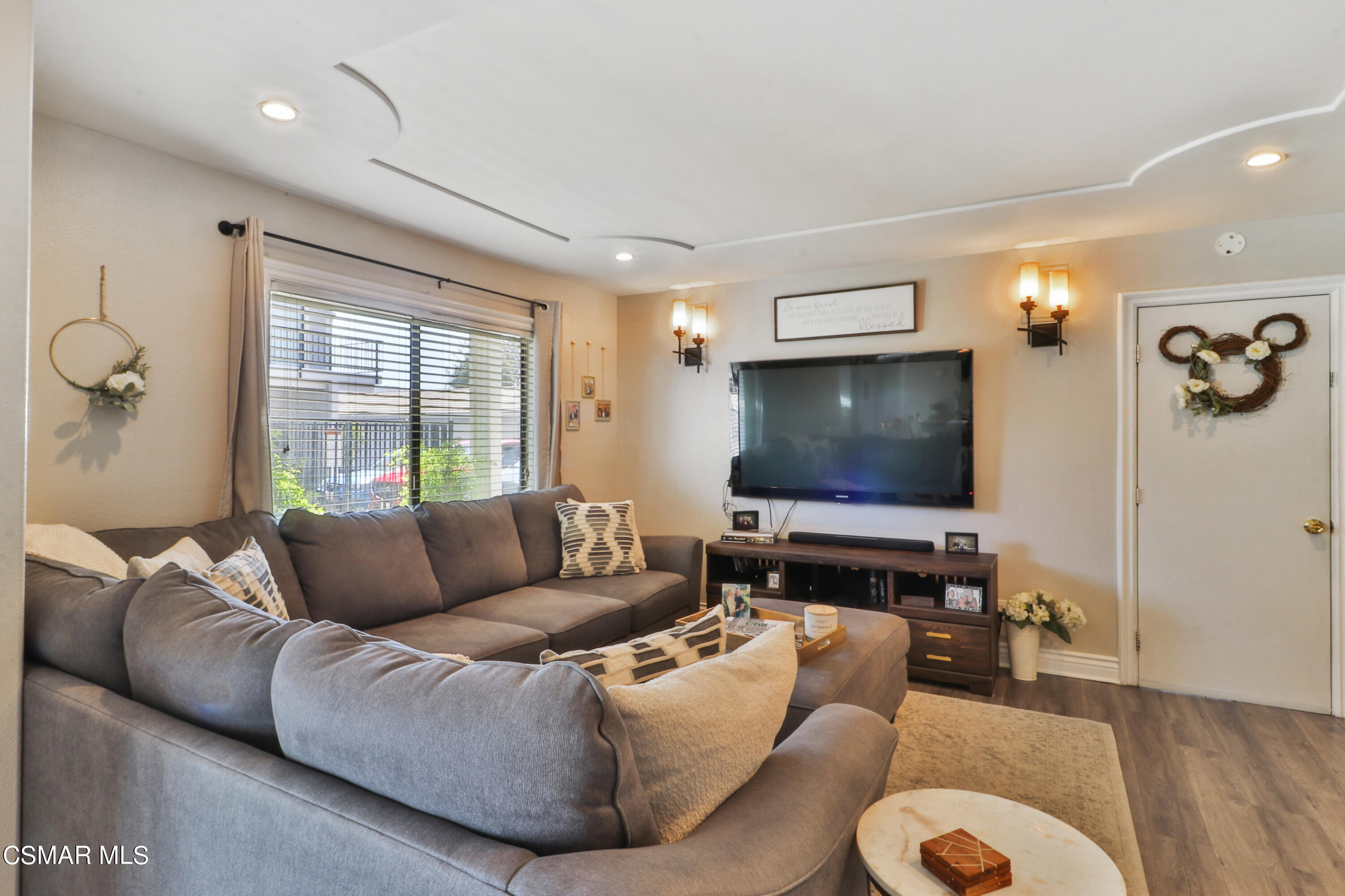 2346 Royal Avenue, Unit 9 Simi Valley, CA 93065 - Photo 7 of 31 a living room with furniture and a flat screen tv