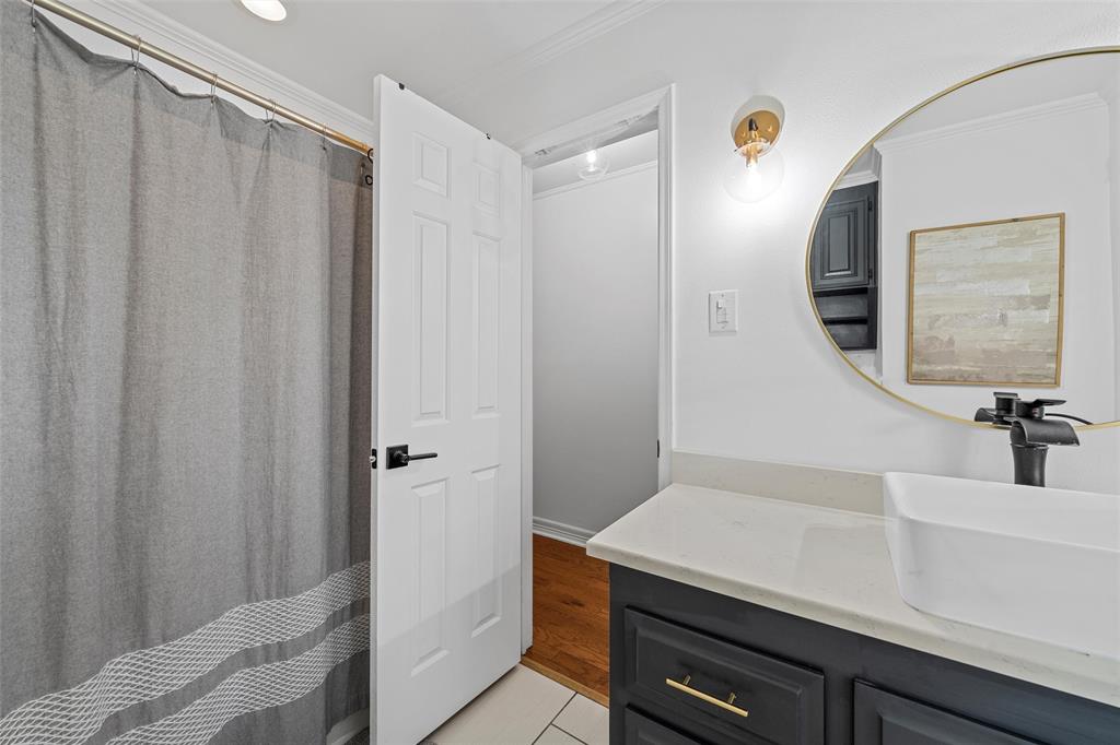 3000 Chimney Hill Drive Waco, TX 76708 - Photo 19 of 37 a bathroom with a sink and a mirror