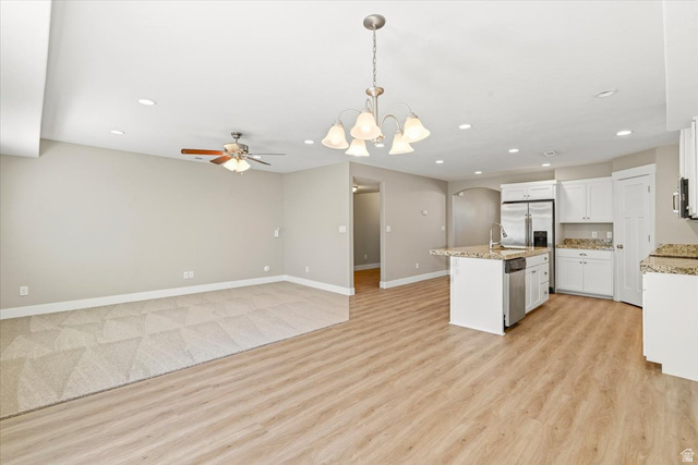 857 225 South Springville, UT 84663 - Photo 6 of 23 Open-concept living space featuring wood-finish flooring, recessed lighting, and a ceiling fan