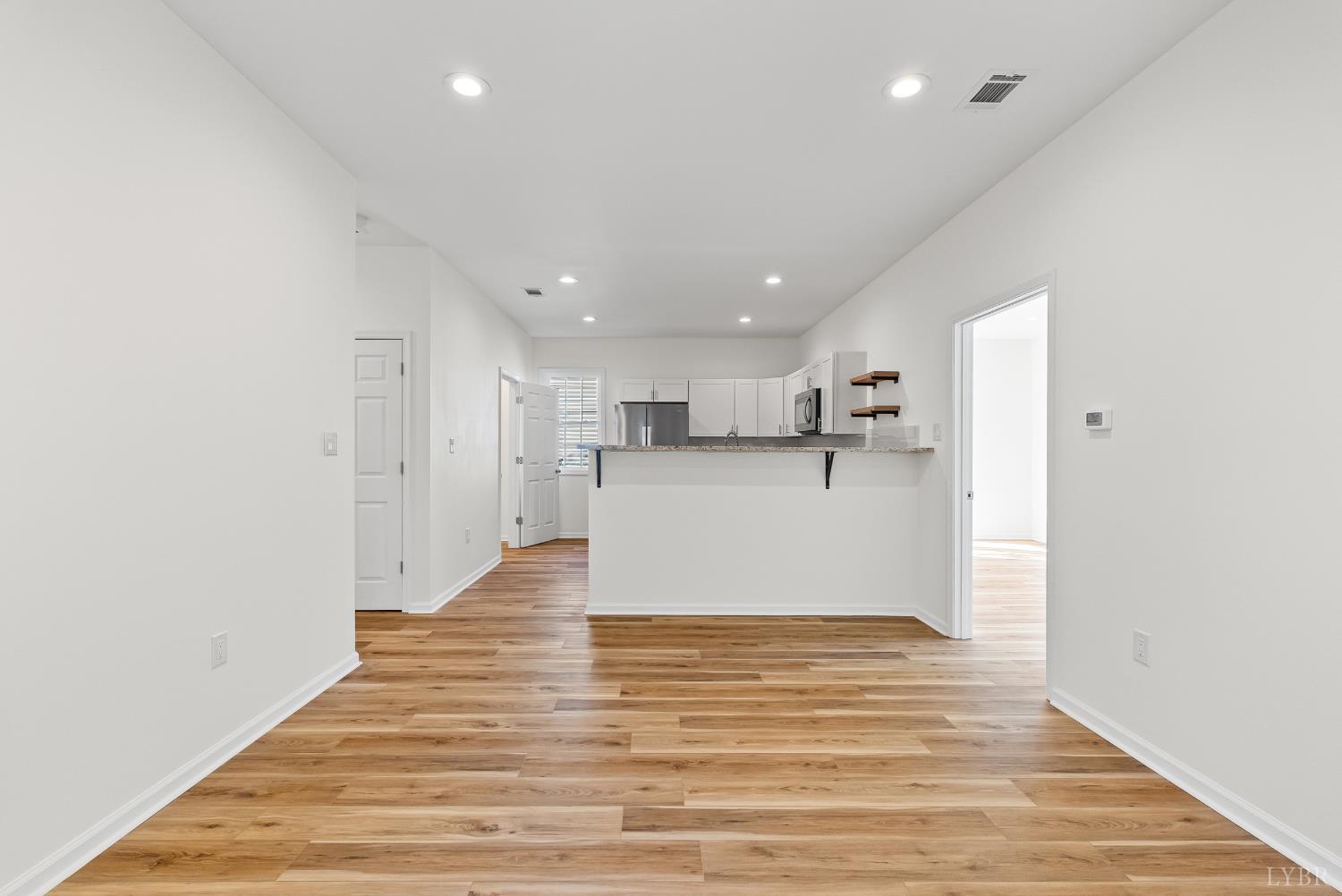 504 Amherst Street Lynchburg, VA 24504 - Photo 13 of 37 a view of kitchen with wooden floor