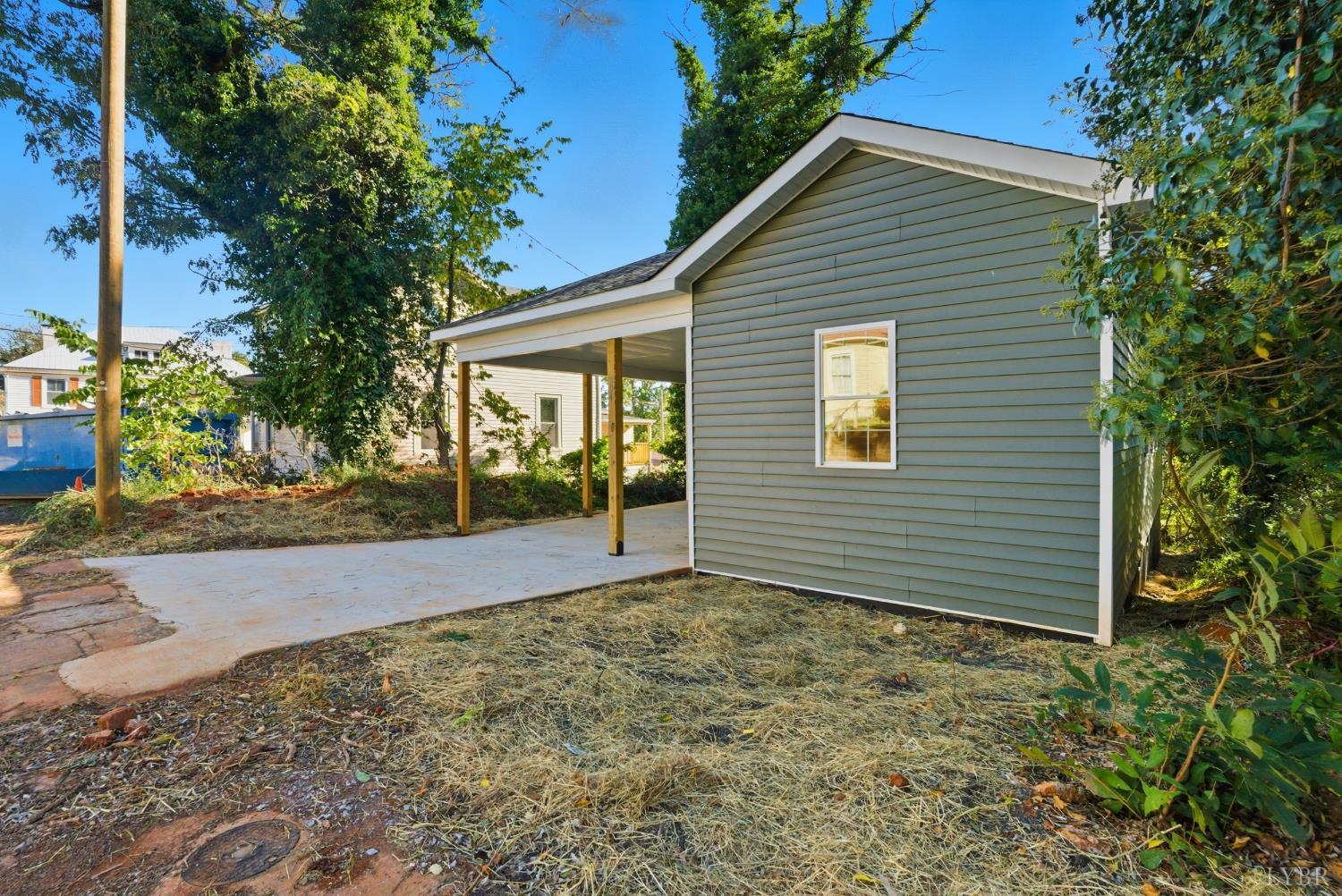 504 Amherst Street Lynchburg, VA 24504 - Photo 35 of 37 a view of a house with a yard