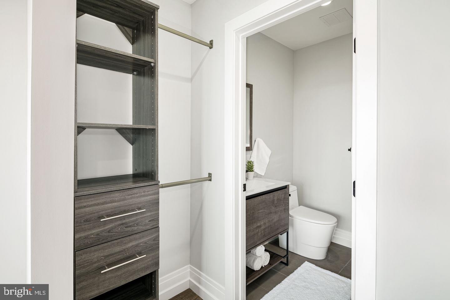 526 Brown Street, Unit 207 Philadelphia, PA 19123 - Photo 19 of 27 a bathroom with a toilet and a shower