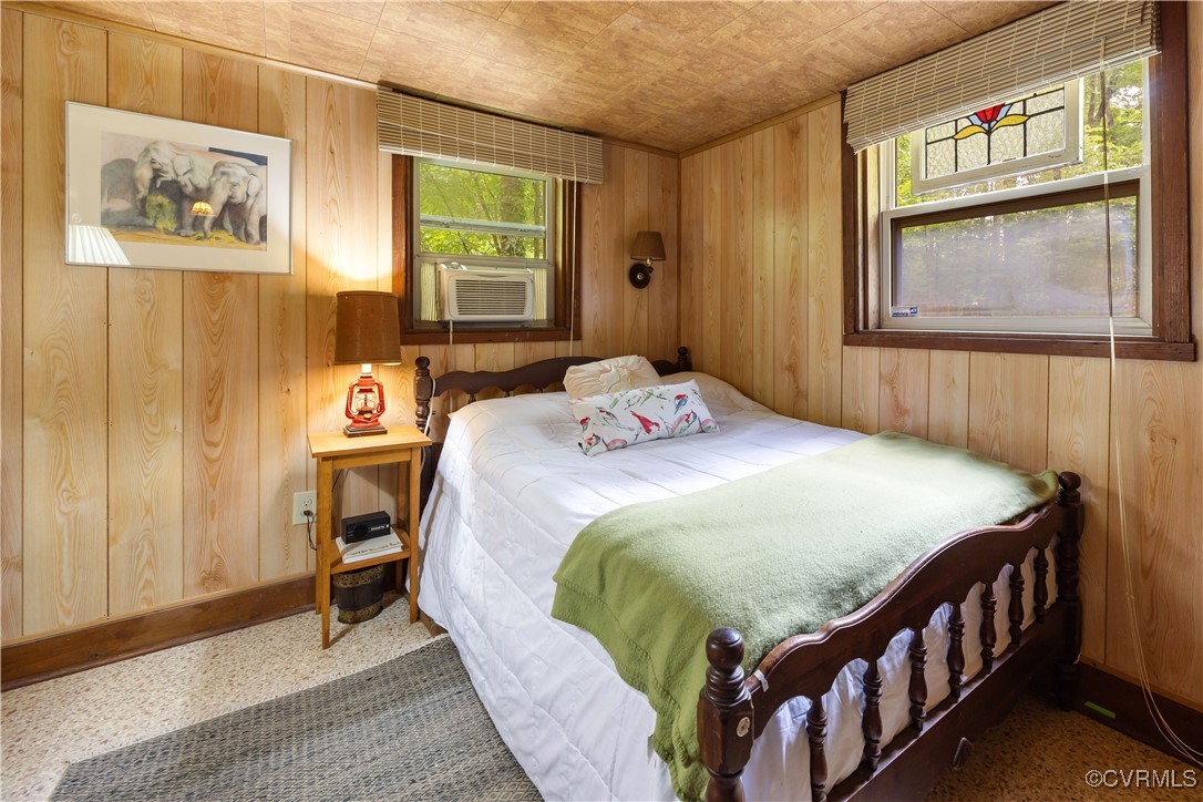 198 Trices Lake Road Columbia, VA 23038 - Photo 18 of 38 a bedroom with a bed and a window