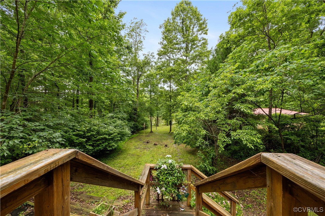 198 Trices Lake Road Columbia, VA 23038 - Photo 23 of 38 a view of a house with a yard