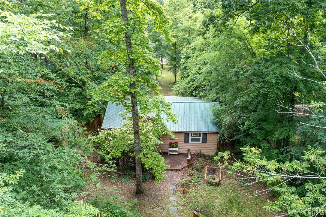 198 Trices Lake Road Columbia, VA 23038 - Photo 6 of 38 an aerial view of a house with yard and sitting area