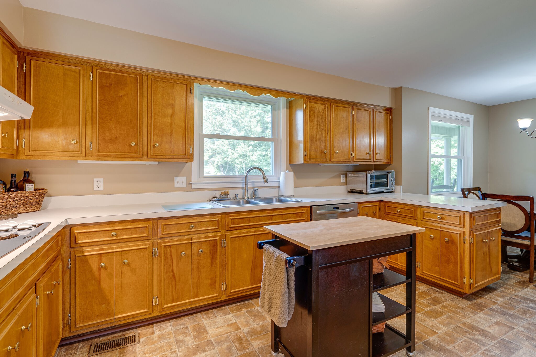 2743 Lights Chapel Road Greenbrier, TN 37073 - Photo 12 of 37 a kitchen with stainless steel appliances granite countertop a sink stove and refrigerator