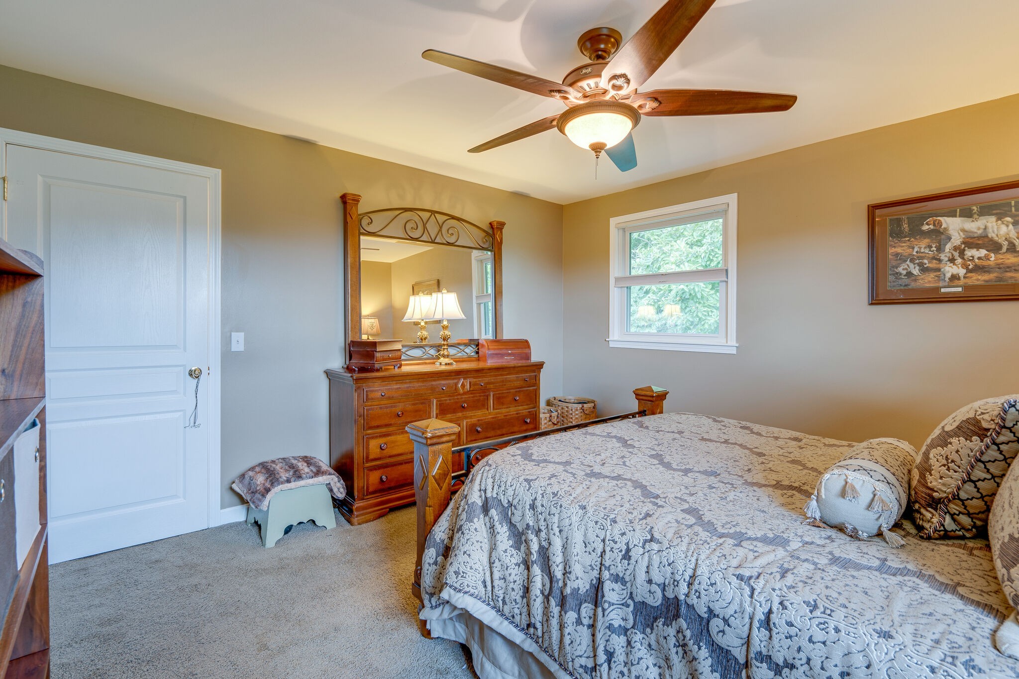 2743 Lights Chapel Road Greenbrier, TN 37073 - Photo 16 of 37 a bedroom with a bed and a chandelier