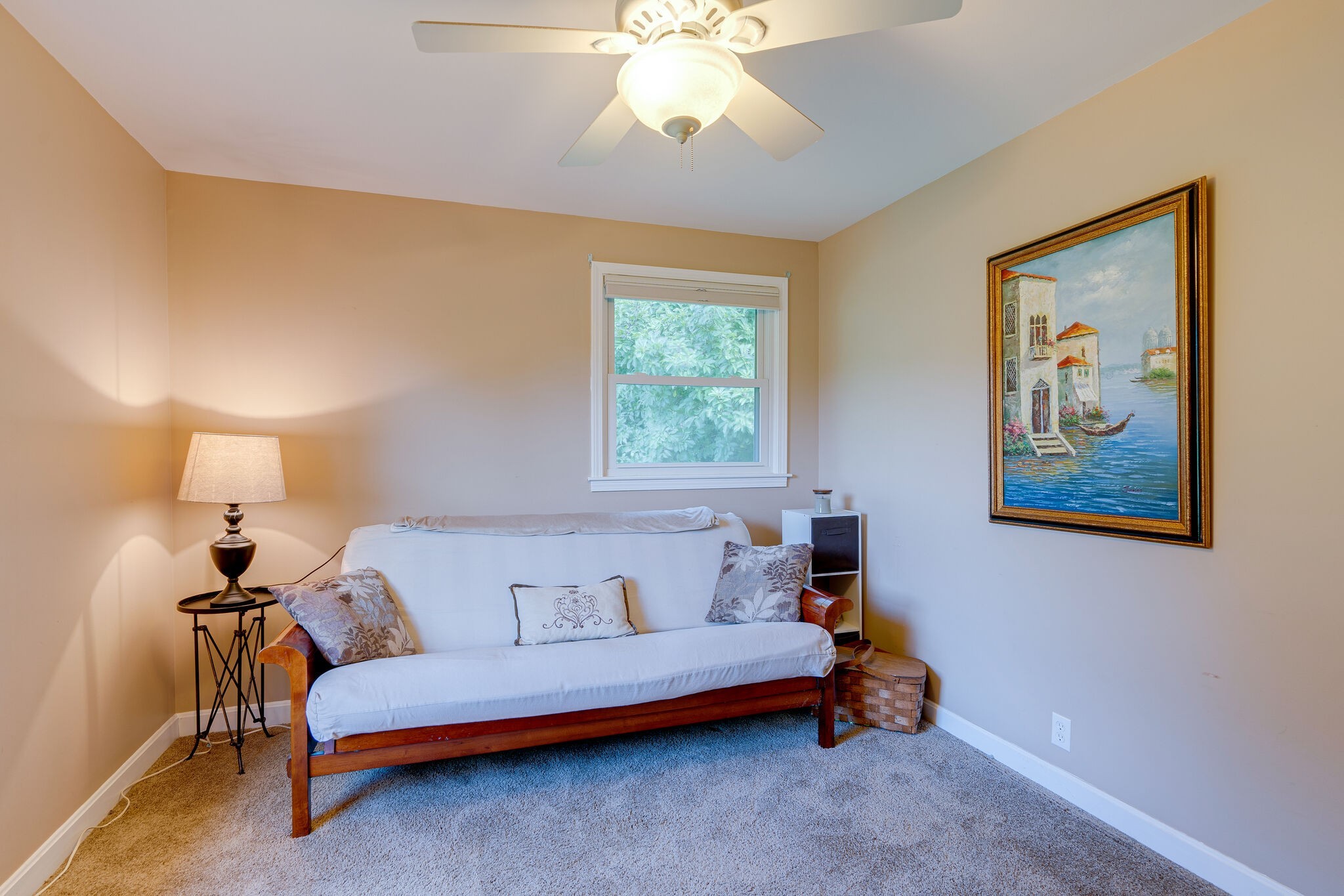 2743 Lights Chapel Road Greenbrier, TN 37073 - Photo 19 of 37 a bedroom with a bed and a chandelier