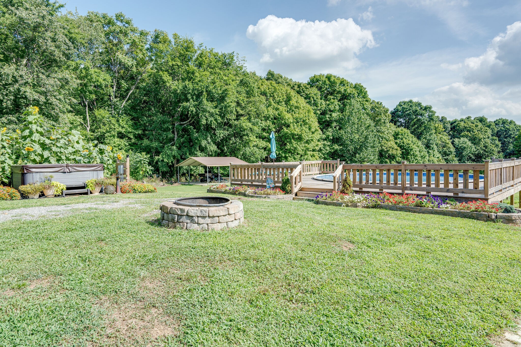 2743 Lights Chapel Road Greenbrier, TN 37073 - Photo 26 of 37 a view of a garden with deck