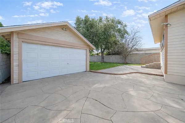a view of backyard of house