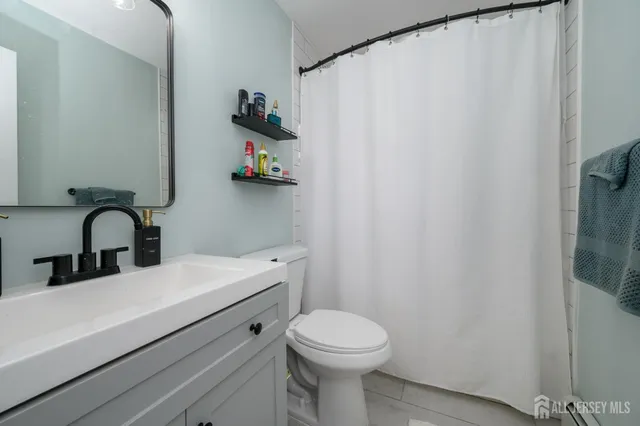 a bathroom with a sink and a toilet