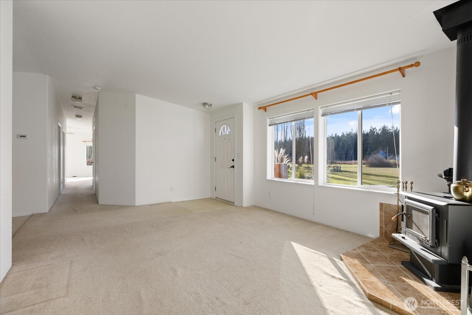4522 Monkey Hill Road Oak Harbor, WA 98277 - Photo 11 of 40 a view of an empty room with a window