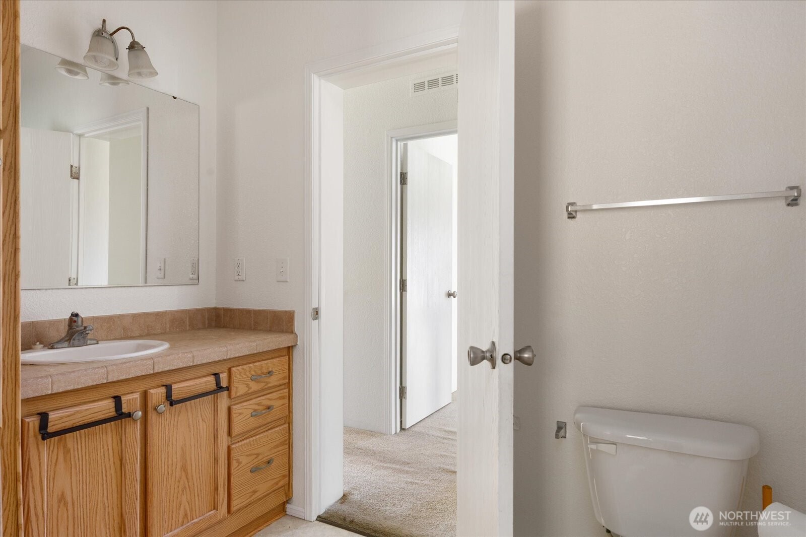 4522 Monkey Hill Road Oak Harbor, WA 98277 - Photo 12 of 40 a bathroom with a granite countertop sink toilet and shower