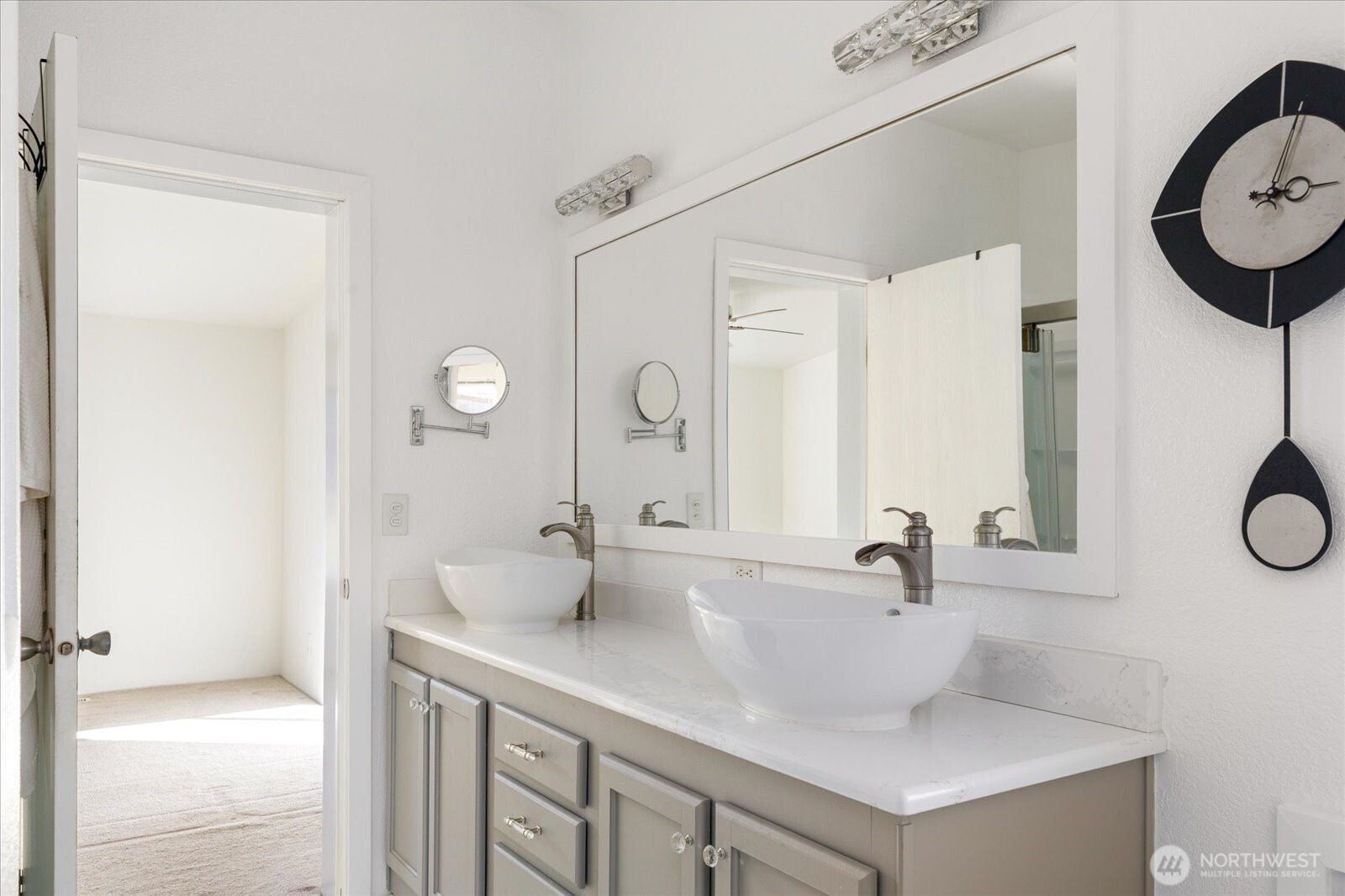 4522 Monkey Hill Road Oak Harbor, WA 98277 - Photo 18 of 40 a bathroom with a sink and a mirror