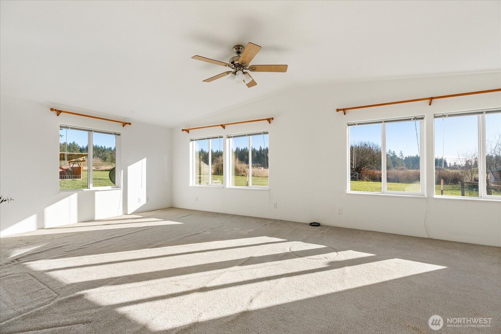 4522 Monkey Hill Road Oak Harbor, WA 98277 - Photo 19 of 40 a view of an empty room with a window