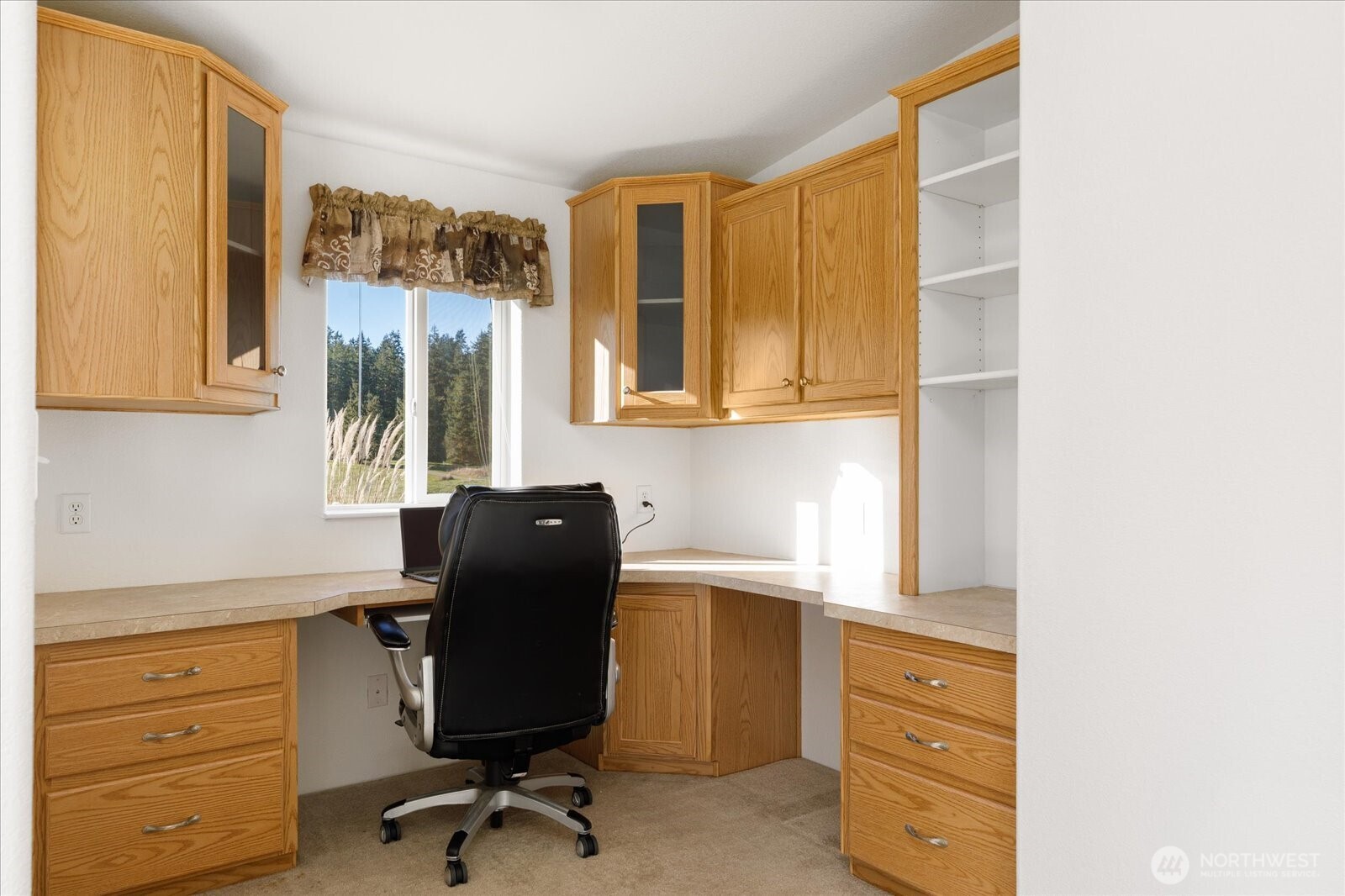 4522 Monkey Hill Road Oak Harbor, WA 98277 - Photo 23 of 40 a view of a workspace with furniture and a window