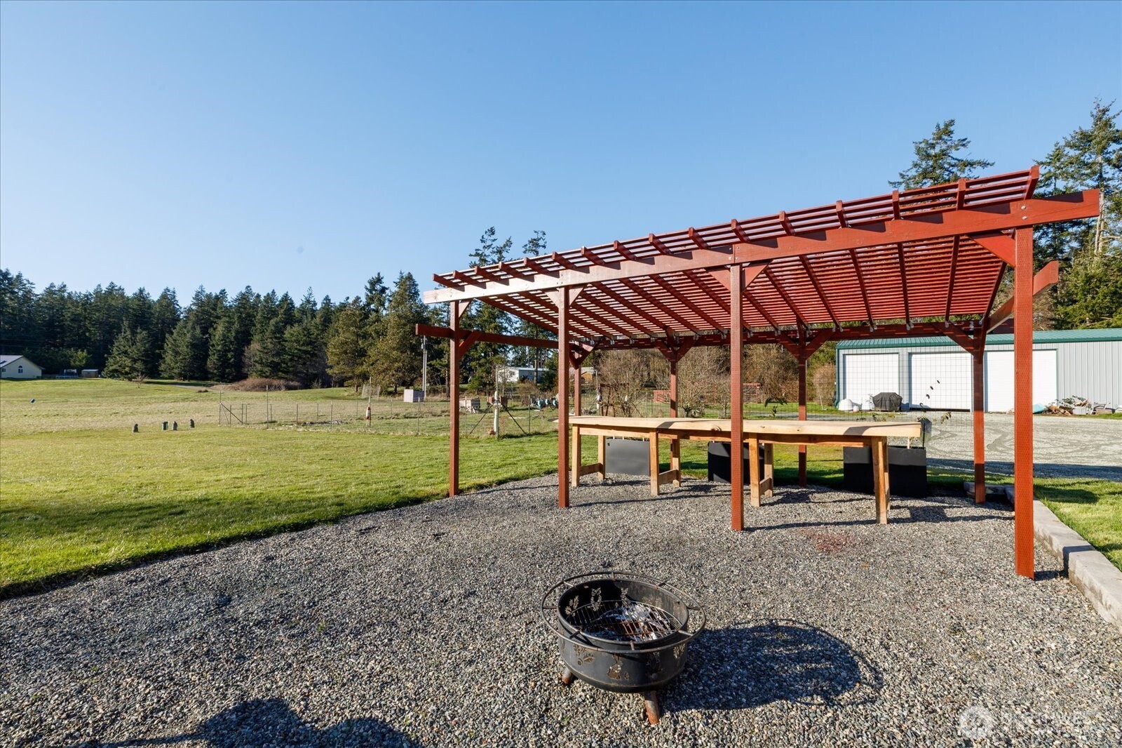 4522 Monkey Hill Road Oak Harbor, WA 98277 - Photo 34 of 40 a view of a swimming pool with a patio