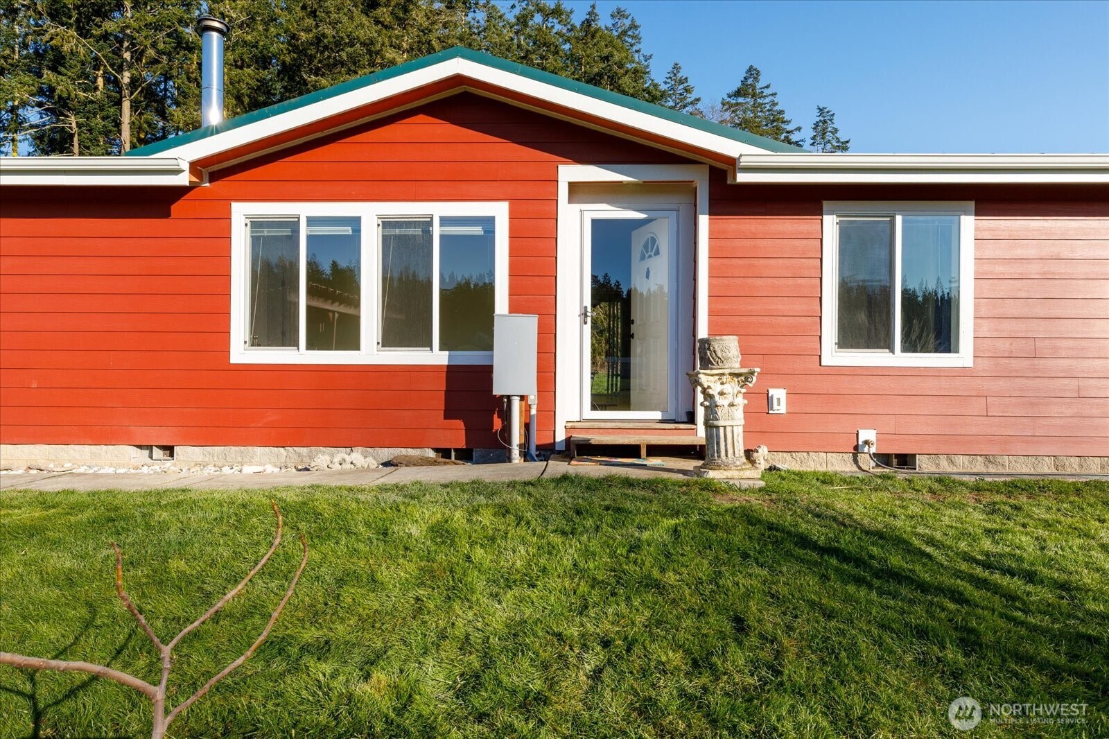 4522 Monkey Hill Road Oak Harbor, WA 98277 - Photo 36 of 40 a front view of a house with a yard