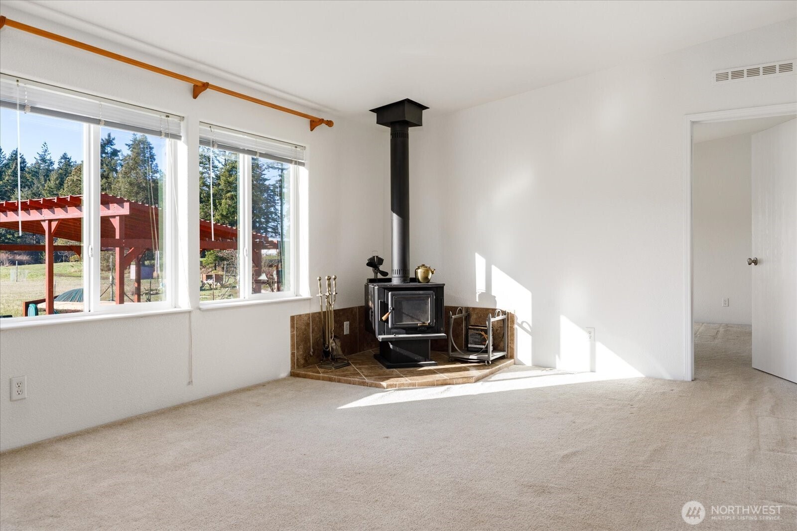 4522 Monkey Hill Road Oak Harbor, WA 98277 - Photo 4 of 40 a living room with furniture and a large window