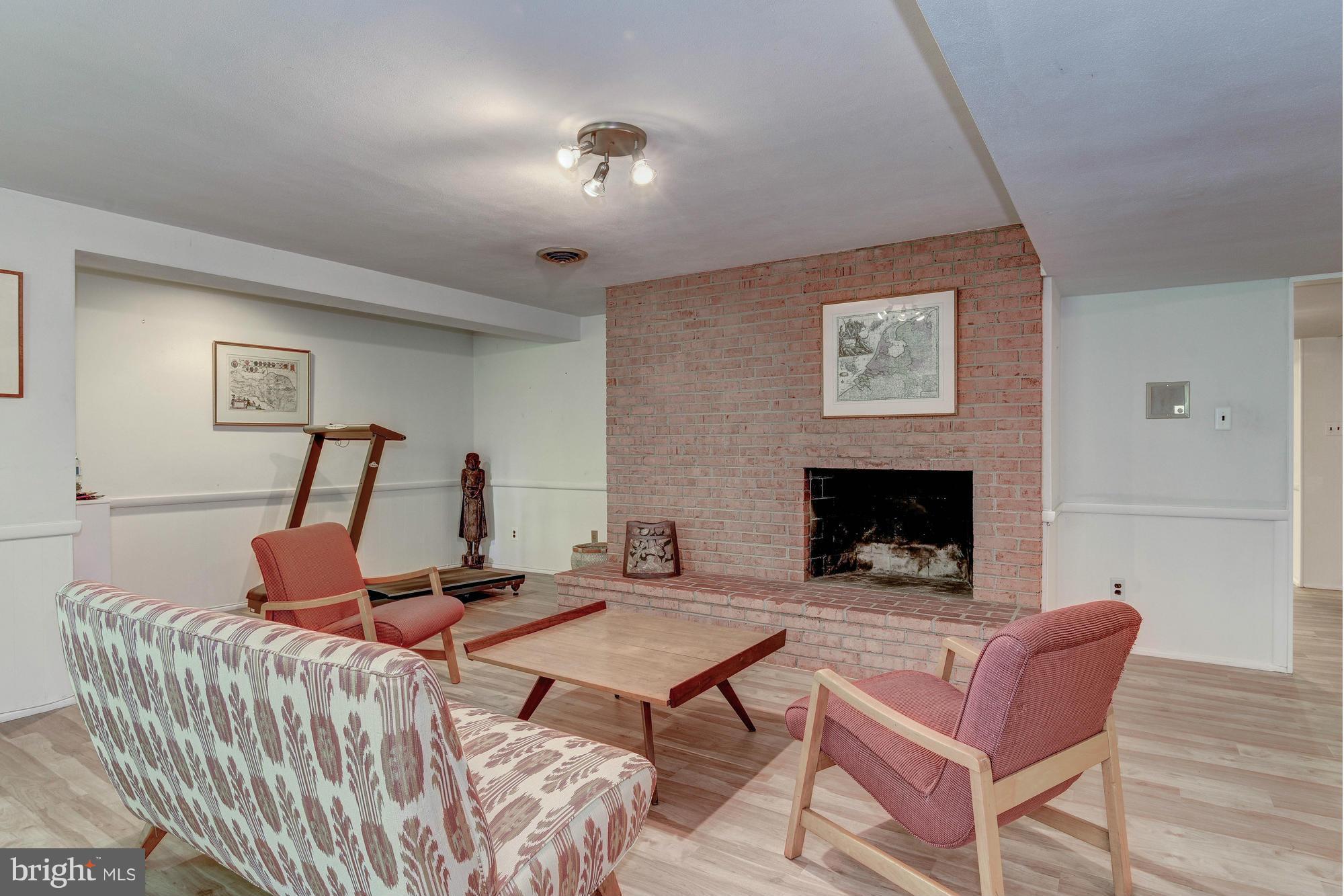 7417 Arrowood Road Bethesda, MD 20817 - Photo 22 of 30 Rec Room Fireplace