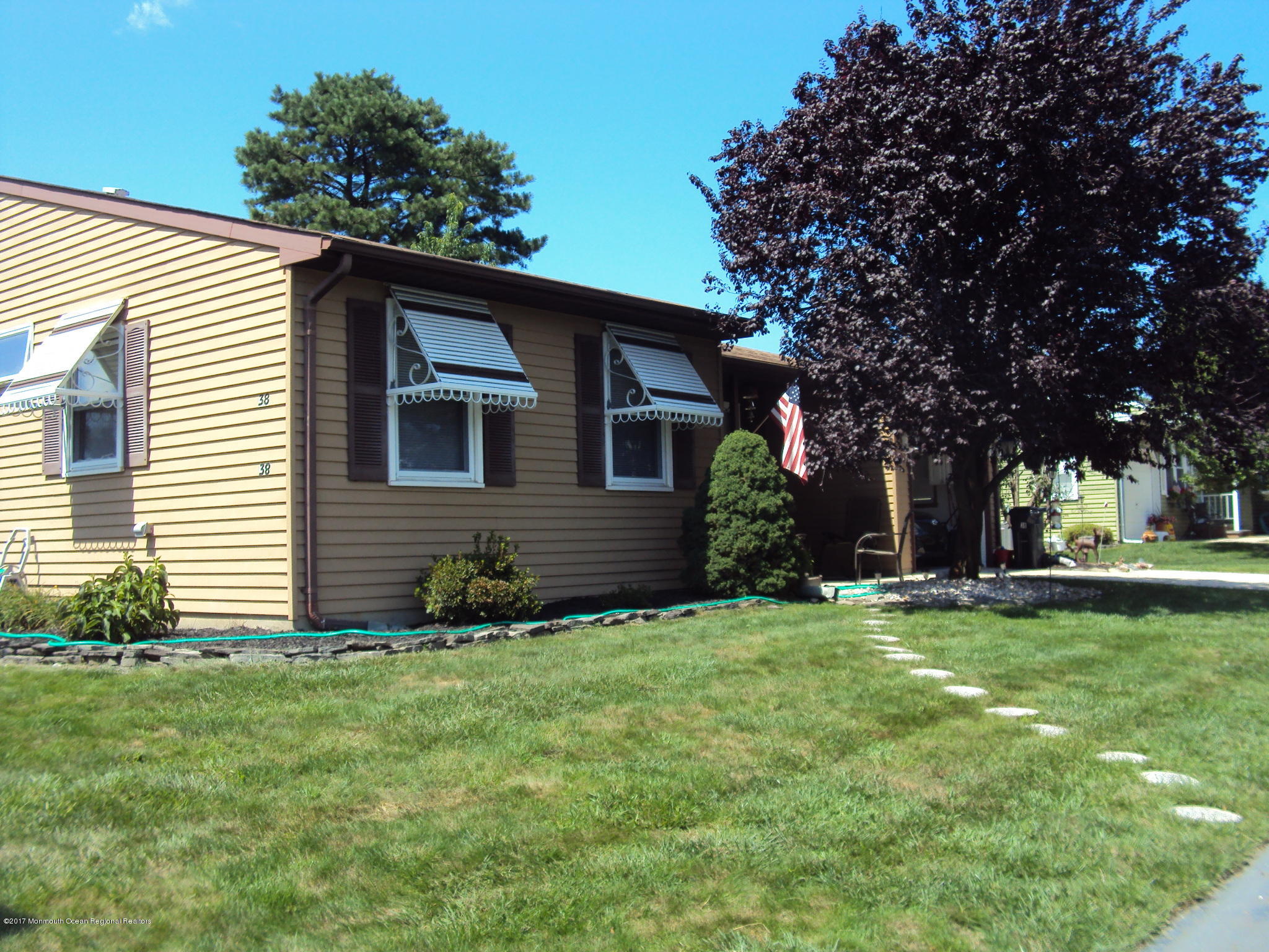 38 Hartford Road, Unit 73 Whiting, NJ 08759 - Photo 1 of 25 a view of a house with a yard