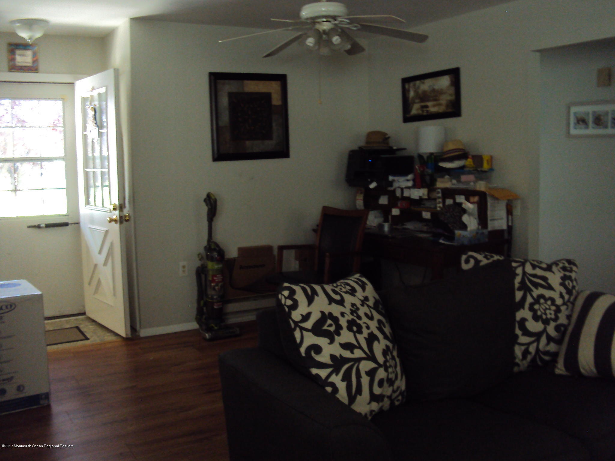 38 Hartford Road, Unit 73 Whiting, NJ 08759 - Photo 15 of 25 a room with furniture and wooden floor