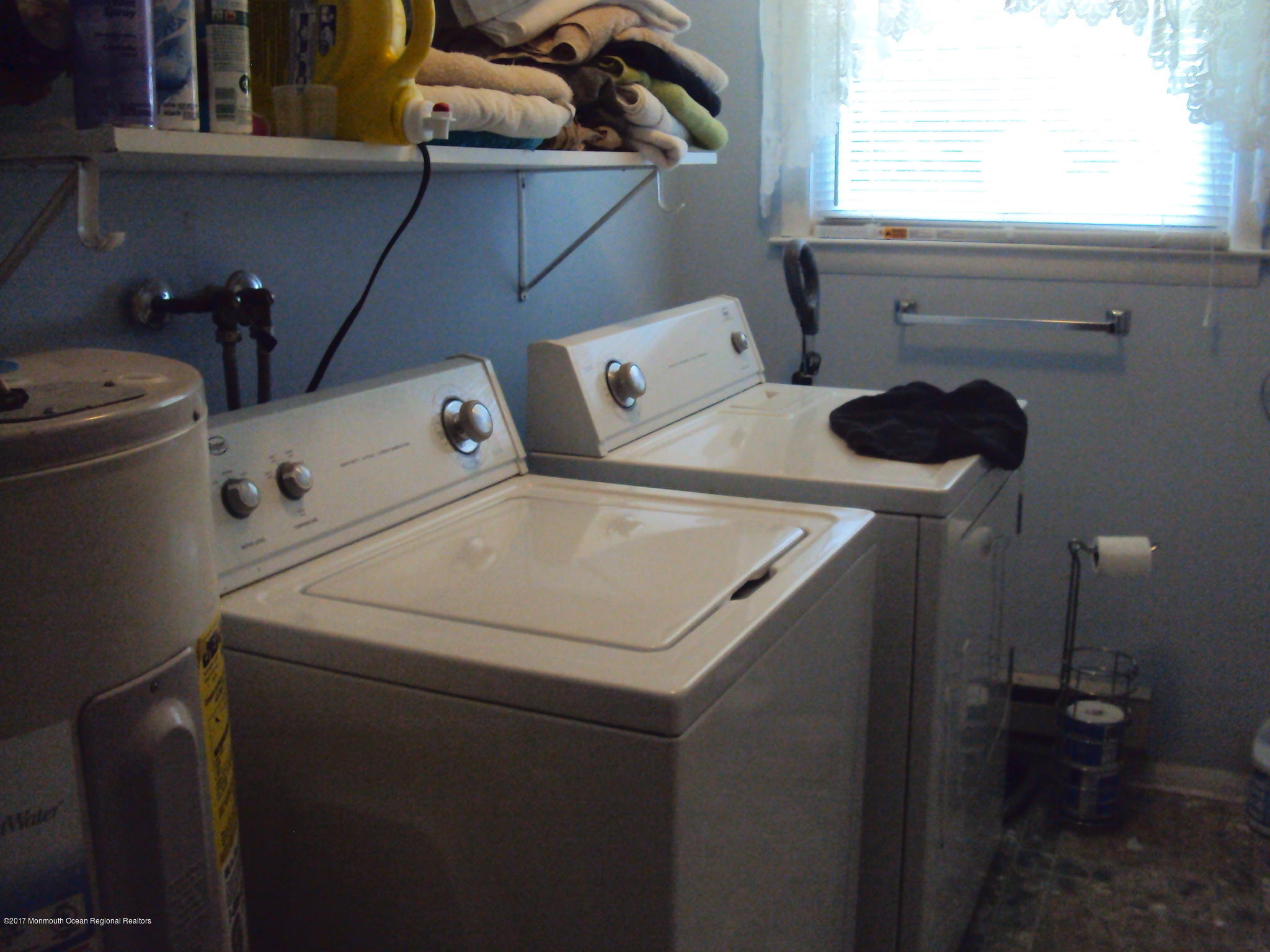 38 Hartford Road, Unit 73 Whiting, NJ 08759 - Photo 20 of 25 a utility room with dryer and washer