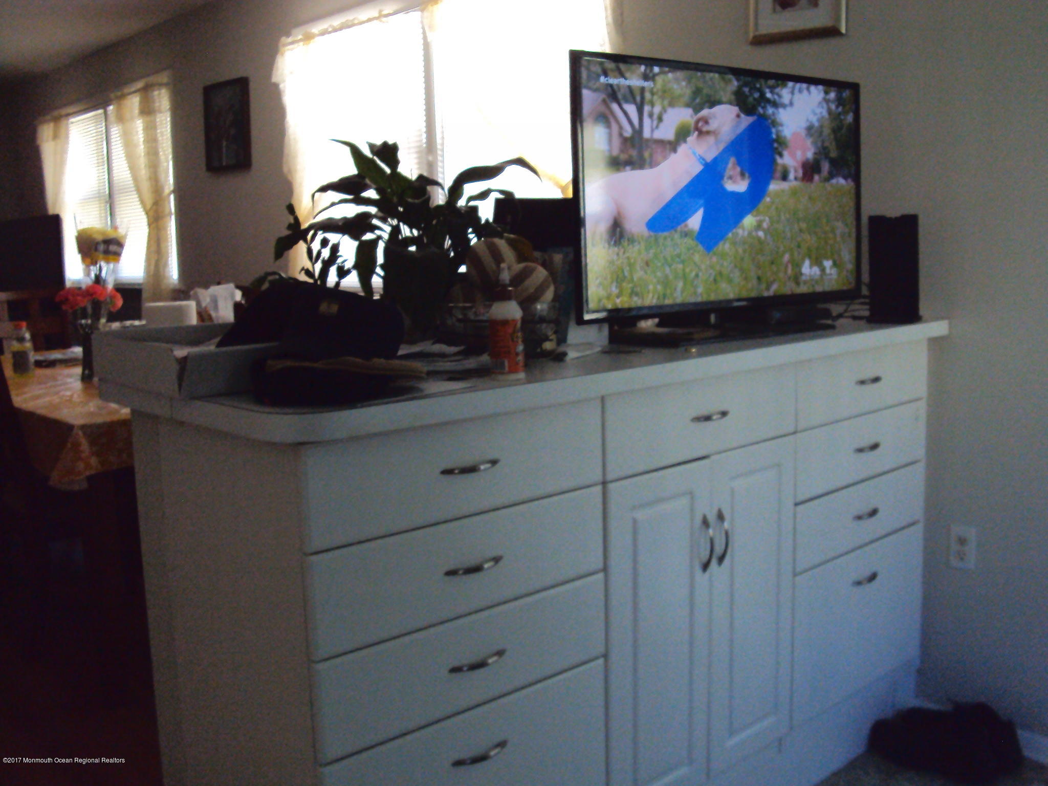 38 Hartford Road, Unit 73 Whiting, NJ 08759 - Photo 23 of 25 a view of living room with furniture and flat screen tv
