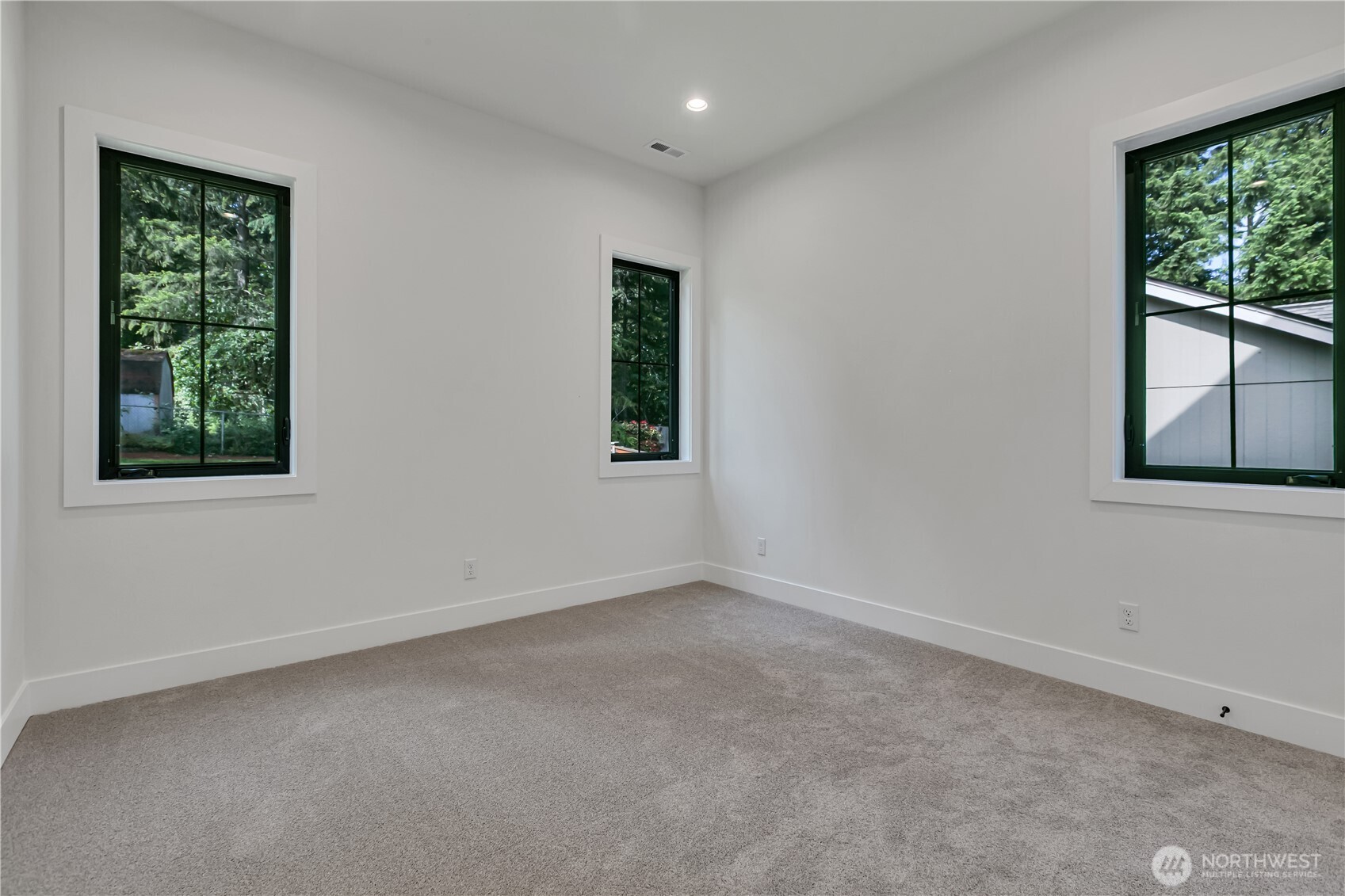 6709 254th Street East Graham, WA 98338 - Photo 27 of 40 an empty room with windows