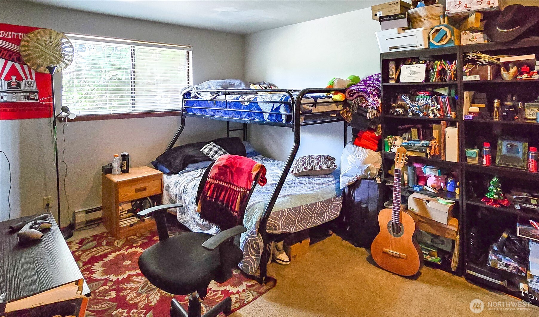 15609 8th Avenue Southwest Burien, WA 98166 - Photo 21 of 26 a living room with lots of furniture and a gym equipment