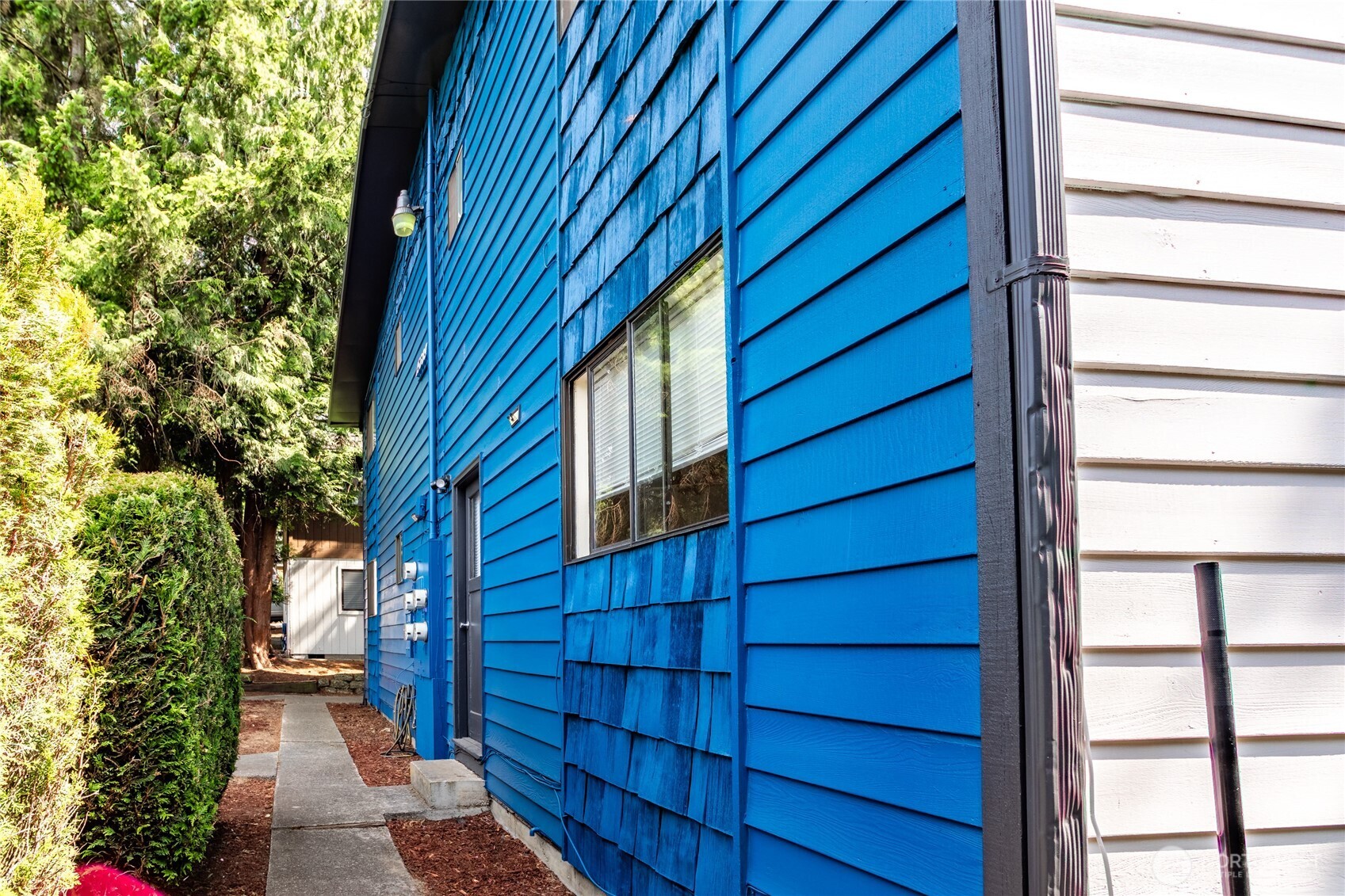 15609 8th Avenue Southwest Burien, WA 98166 - Photo 23 of 26 a view of a house with a backyard