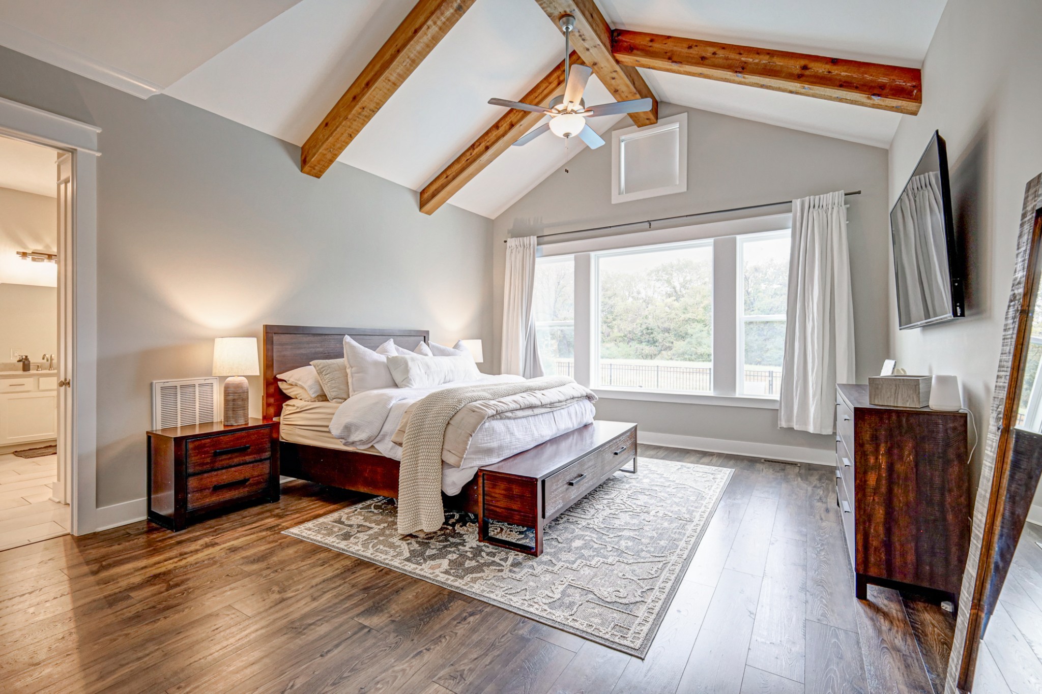 7748 Thayer Road Nolensville, TN 37135 - Photo 12 of 41 a spacious bedroom with a bed and wooden floor