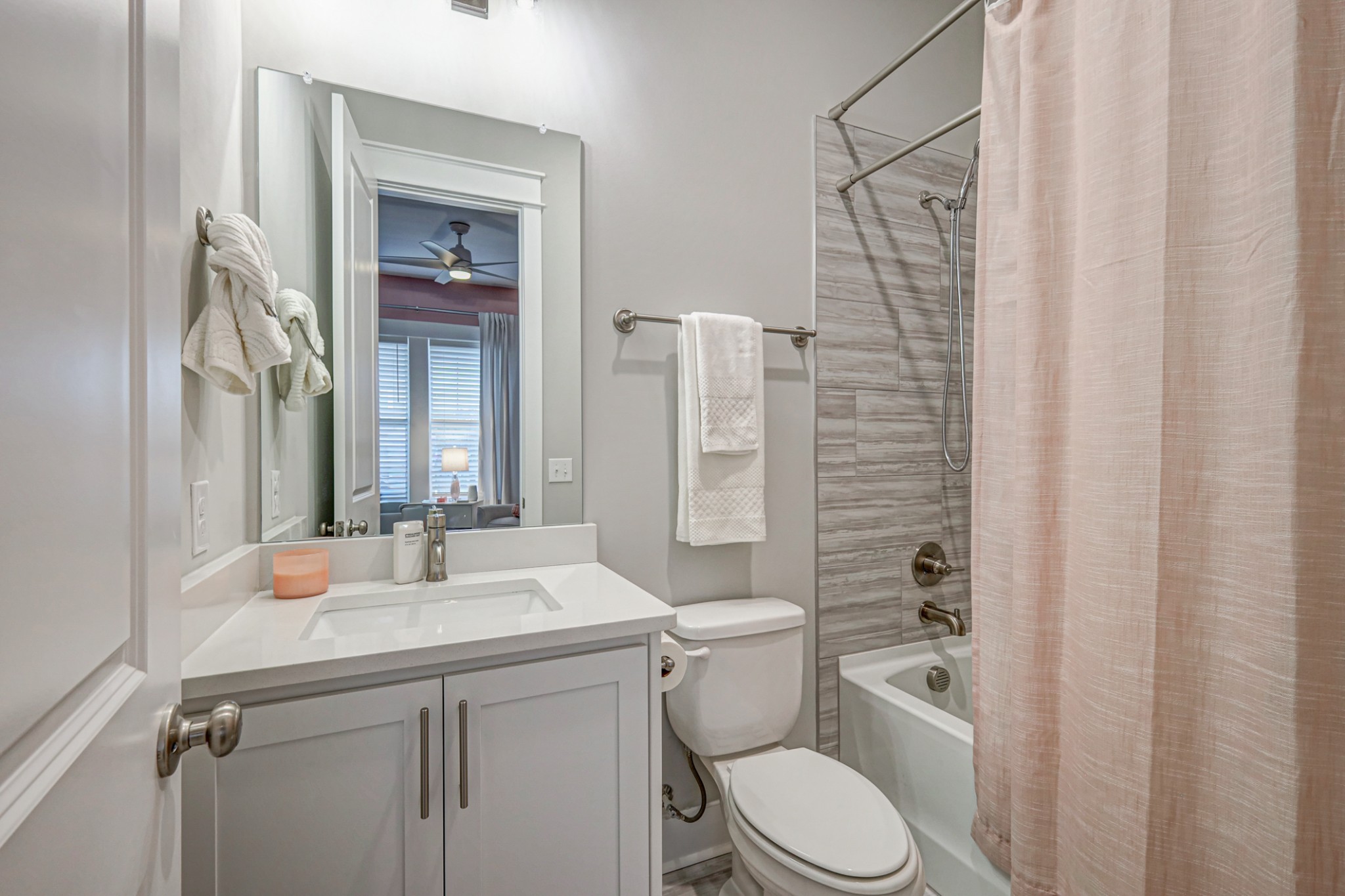7748 Thayer Road Nolensville, TN 37135 - Photo 19 of 41 a bathroom with a granite countertop toilet sink and shower