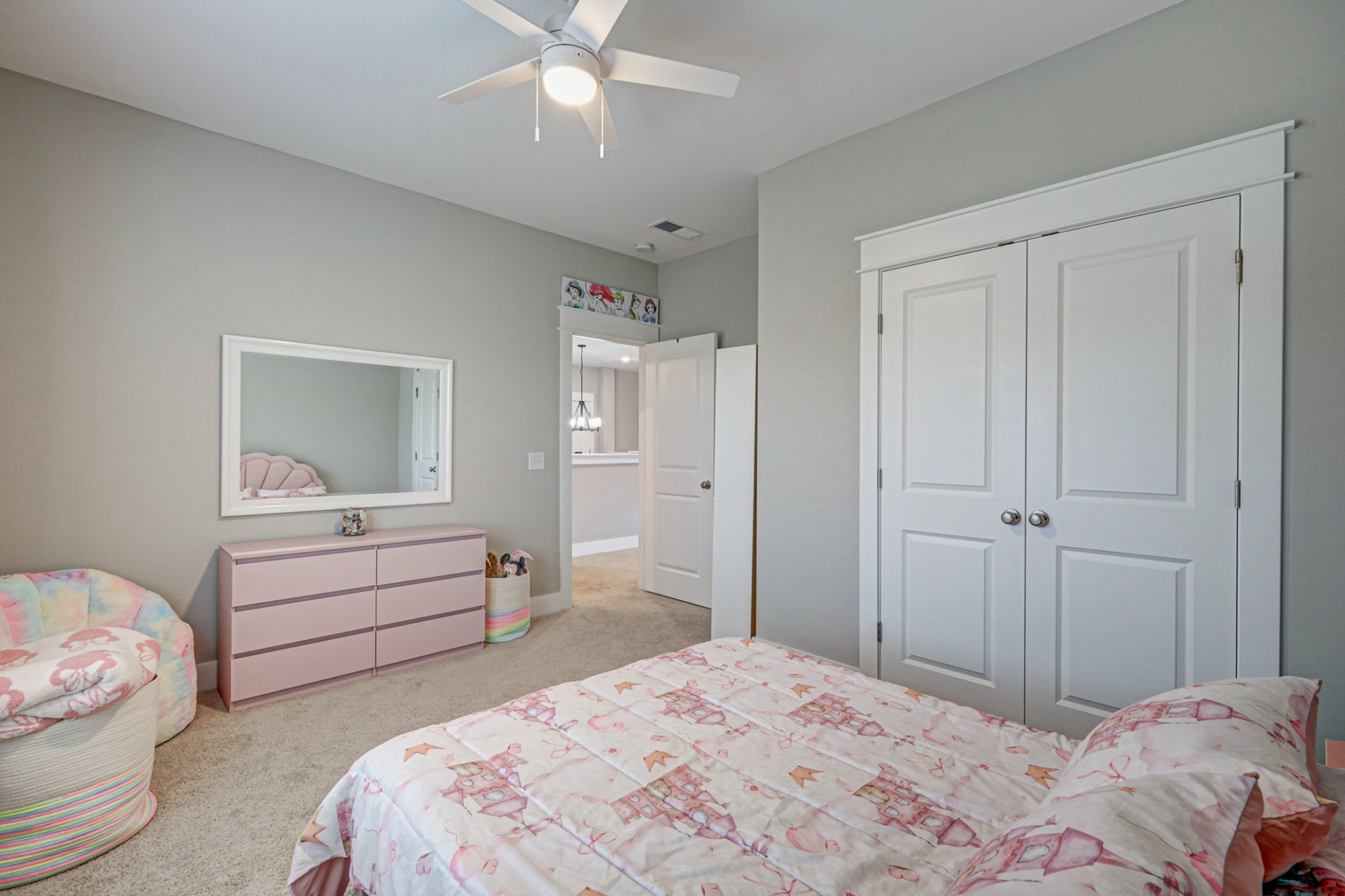 7748 Thayer Road Nolensville, TN 37135 - Photo 27 of 41 a bedroom with a bed and a chandelier