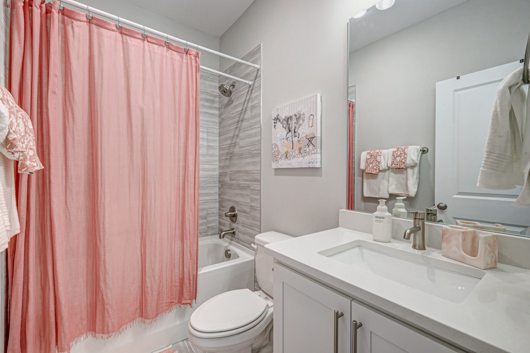 7748 Thayer Road Nolensville, TN 37135 - Photo 28 of 41 a bathroom with a sink a toilet and shower curtain