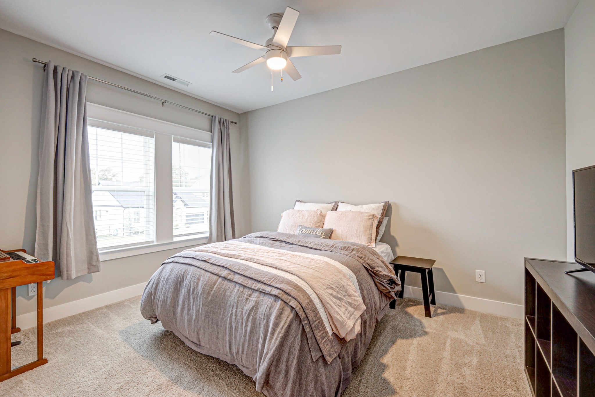 7748 Thayer Road Nolensville, TN 37135 - Photo 30 of 41 a bedroom with a bed and a ceiling fan