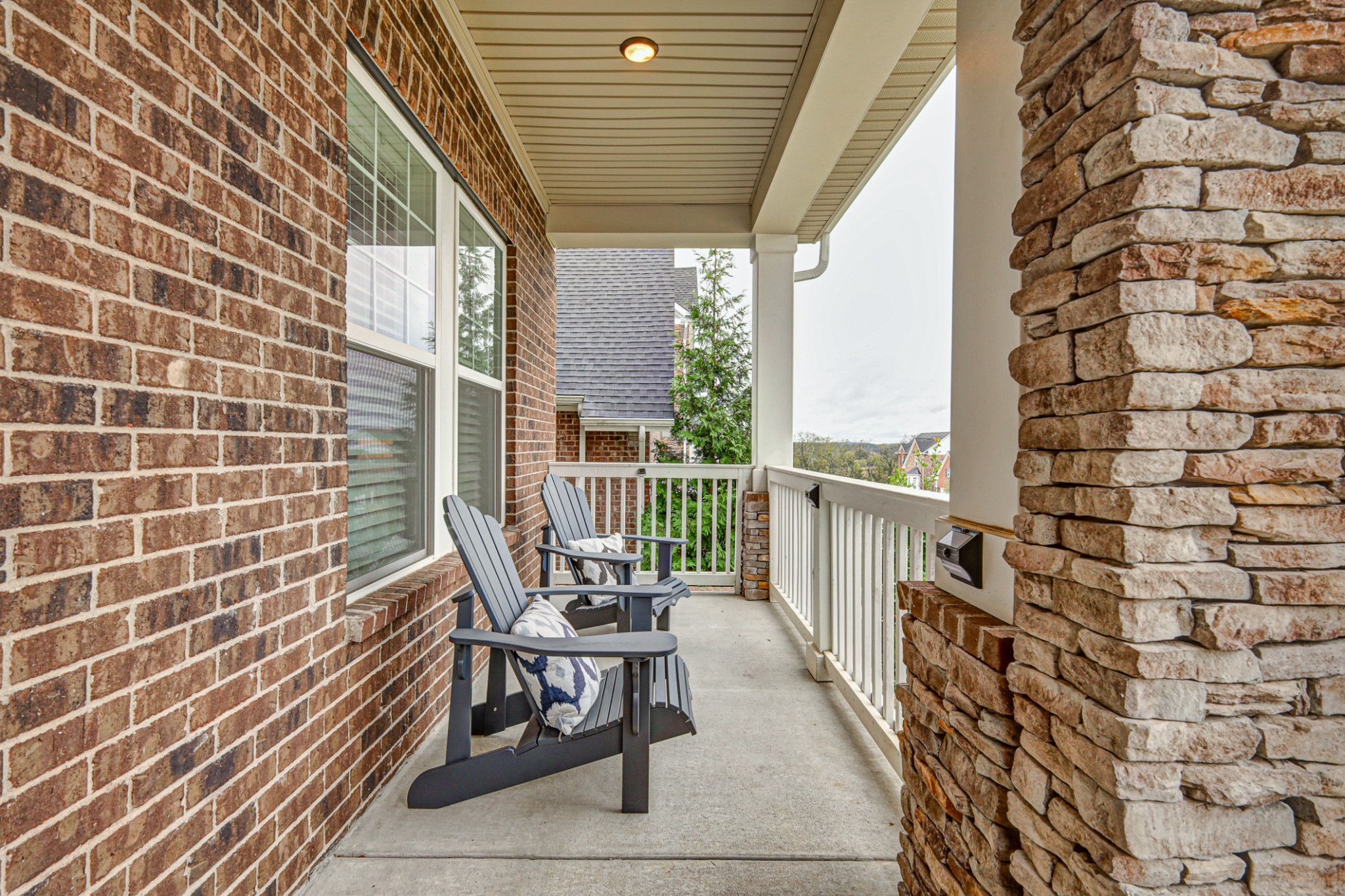 7748 Thayer Road Nolensville, TN 37135 - Photo 32 of 41 a view of a balcony with wooden floor