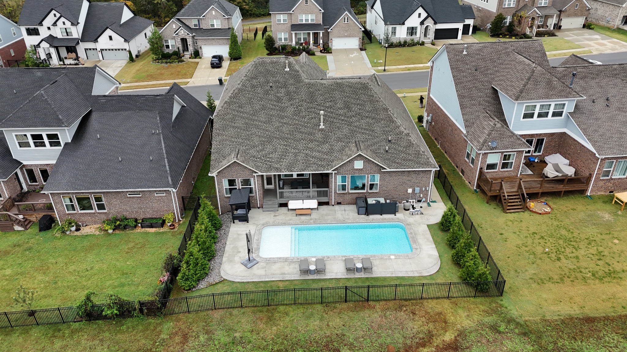 7748 Thayer Road Nolensville, TN 37135 - Photo 33 of 41 an aerial view of a house with swimming pool