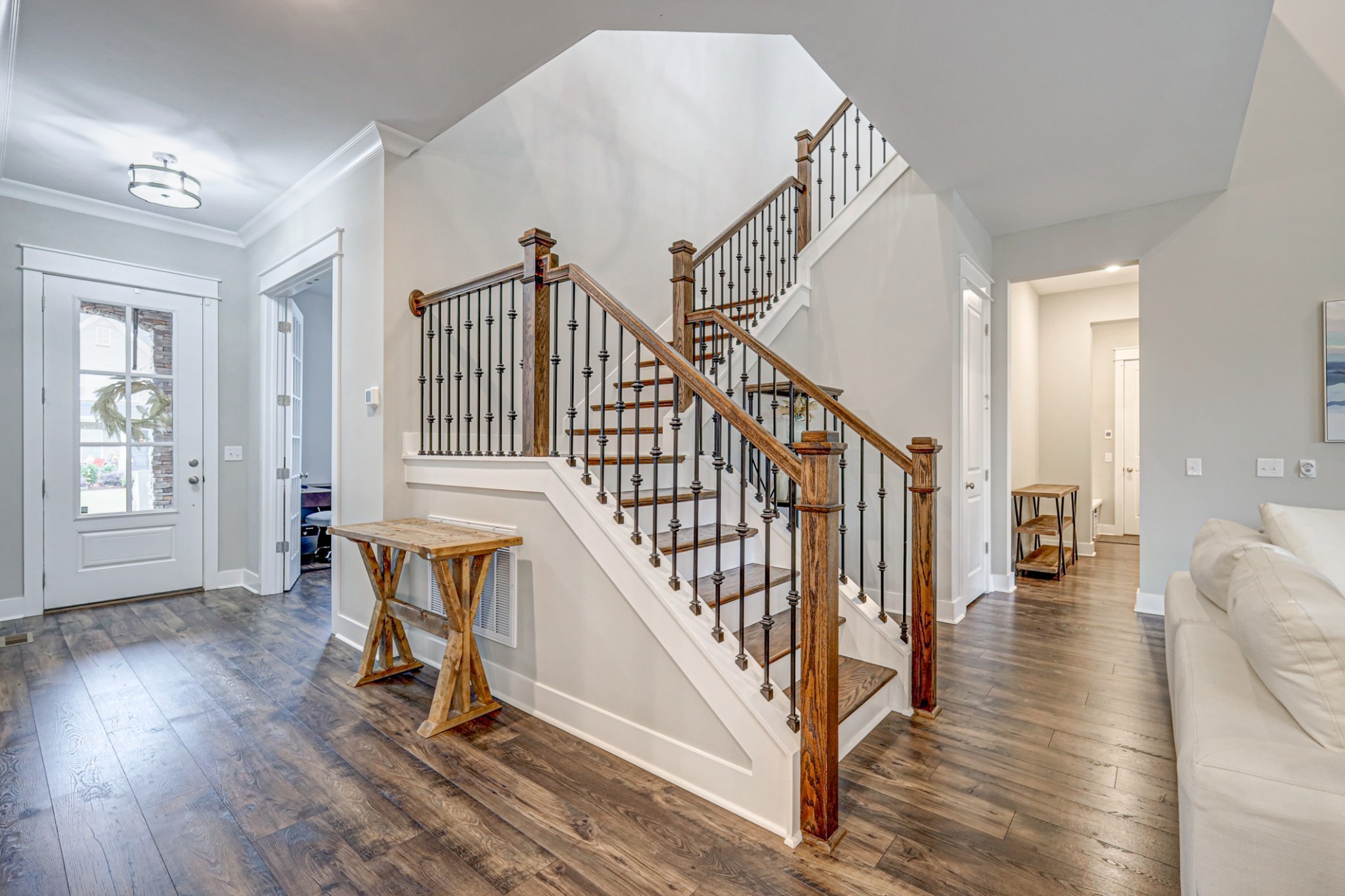 7748 Thayer Road Nolensville, TN 37135 - Photo 7 of 41 a view of entryway and hall with wooden floor