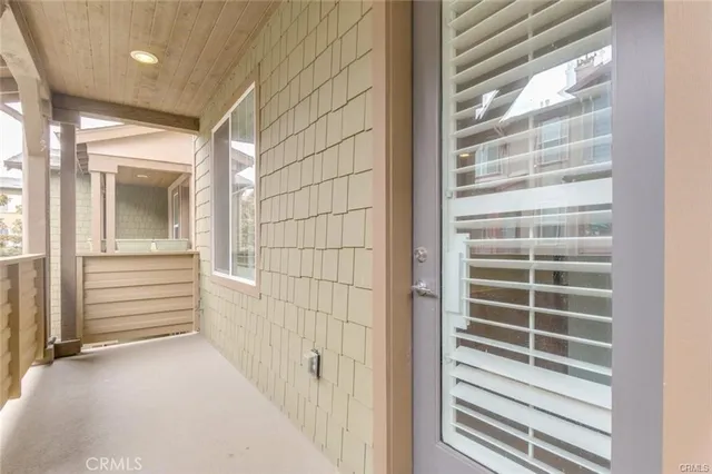 a view of a room with windows