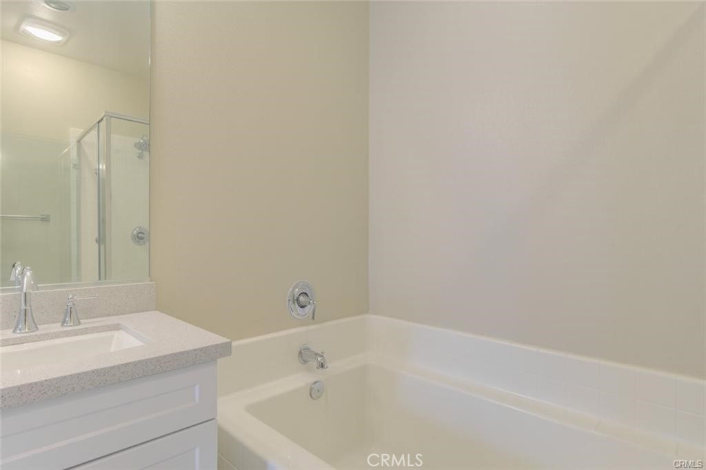 713 South Azusa Avenue, Unit D Azusa, CA 91702 - Photo 22 of 33 a bathroom with a sink and a bathtub