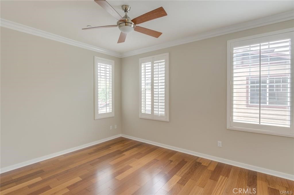 713 South Azusa Avenue, Unit D Azusa, CA 91702 - Photo 24 of 33 a view of empty room with wooden floor and fan