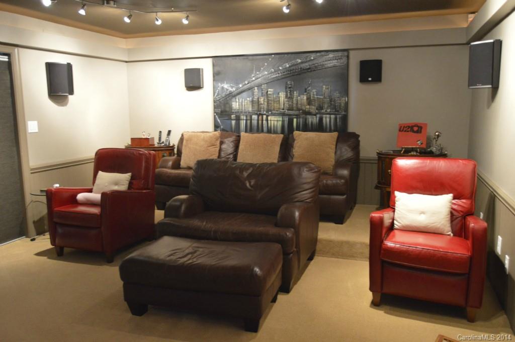 4618 Binfords Ridge Road Charlotte, NC 28226 - Photo 8 of 24 a media room with furniture and a rug