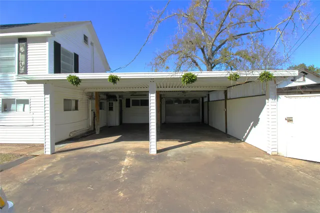 a view of a house with a garage